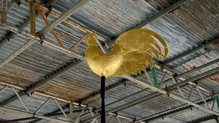 The cockerel weathervane was restored and regilded