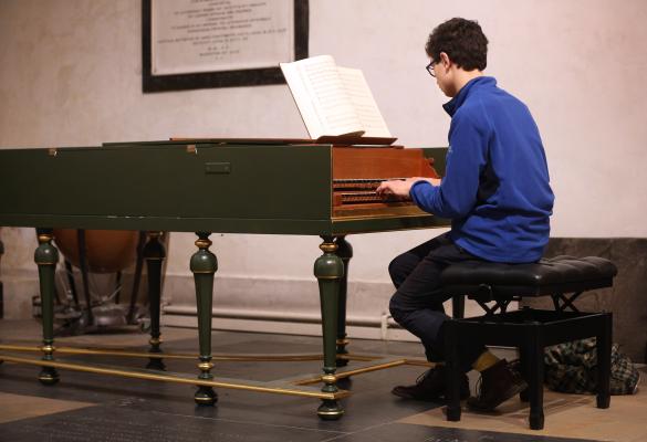 Jesus College Organ Scholar playing the Chapel harpischord 
