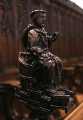 Wood carved figure of a Doctor of Divinity