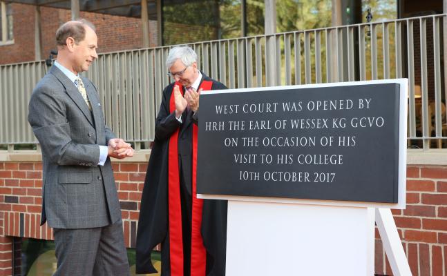 HRH The Earl of Wessex reading the commemorative West Court plaque 