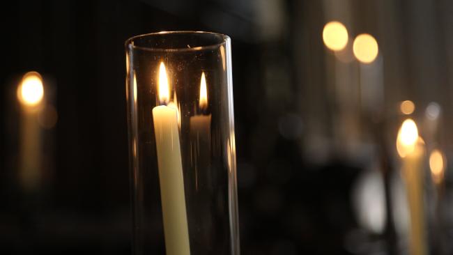 Image of Candle in Chapel Stalls