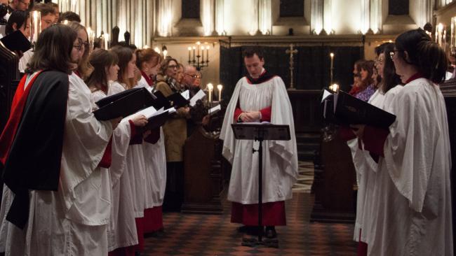 Image of Director of Music conducts evensong