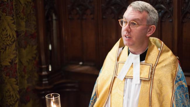 Image of The Dean reads at Evensong