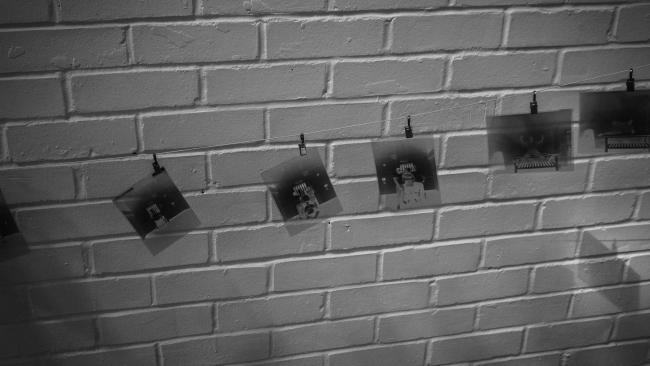 Image of Photos hanging from a string
