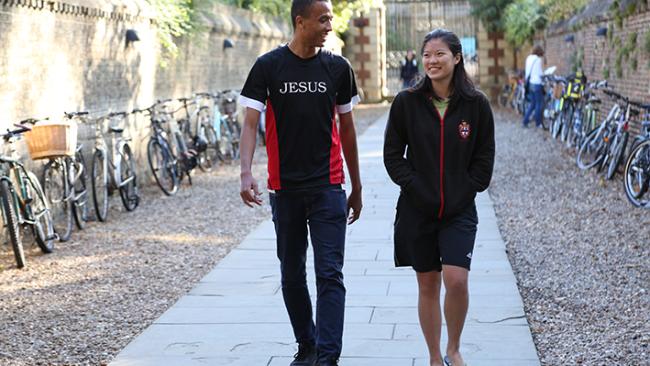Image of Two students walk into Jesus College