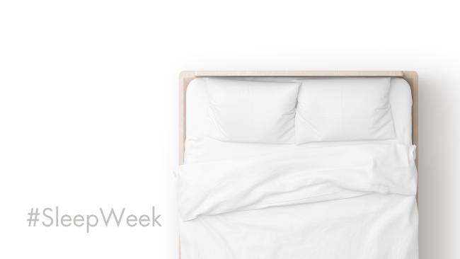 Image of A bed with the hashtag Sleep Week next to it