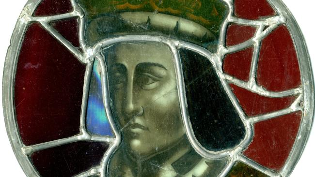 Image of Roundel of surviving East Window glass. Possibly Henry VI or Henry VII. 