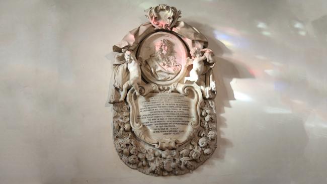 Image of Rustat memorial on the wall in Jesus College Chapel