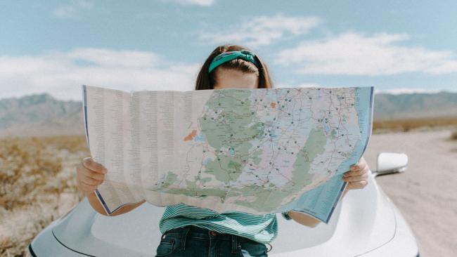 Image of Person looking at a map