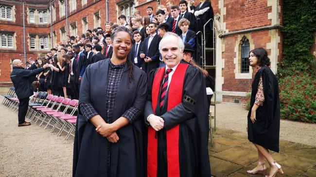 Image of Photo of Master Sonita Alleyne and Senior Tutor Geoff Parks in front of new students