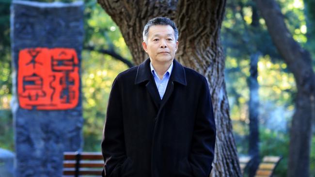 Image of Photo of Prof Angang Hu at Tsinghua University