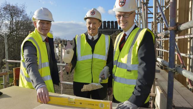 Image of Steve Nugent, Christopher Pratt and Ian White at the topping out ceremony.