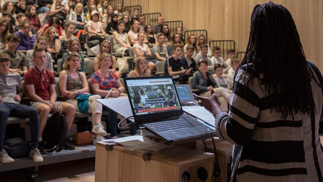 Image of A photo of Sonita Alleyne, Master of Jesus College, giving a talk to Year 10 students.