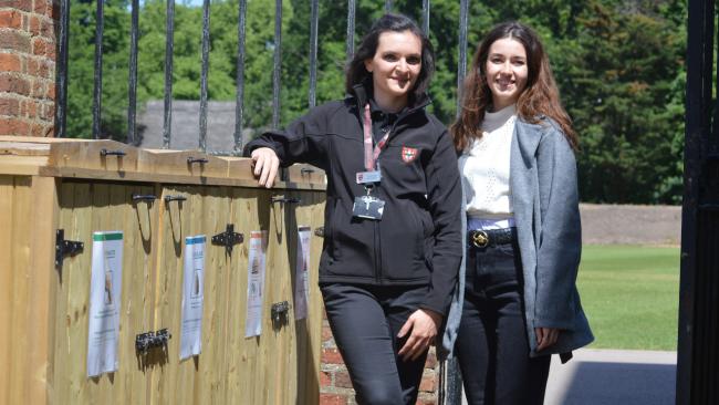 Image of Left to right, Jo Dell'Orto, Manager of the Roost café bar and Jesus resident Justine Lancelin at a waste recycling point in Chapel Court