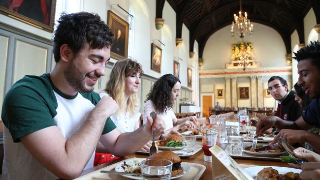 Image of Photo of students eating in Hall 