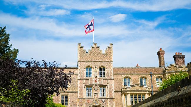 Jesus College Gate Tower with flag