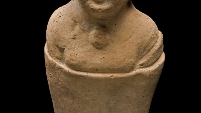Terracotta figure of a swaddled infant