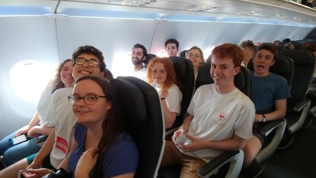 Choir members on a plane 