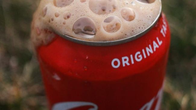 A photograph of a can of coca-cola