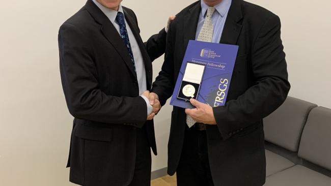 Professor Julian Dowdeswell being presented with the W S Bruce Medal 