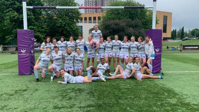 A photo of the University of Cambridge women's rugby Blues squad.